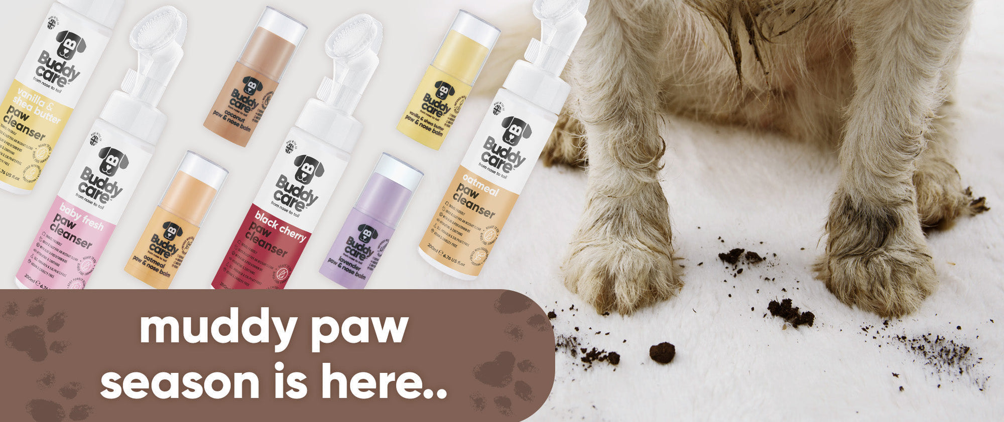 Buddycare muddy paw season banner featuring paw cleansers and balms for dogs with dirty paws on a white rug - perfect for keeping paws clean and protected during wet, muddy weather.